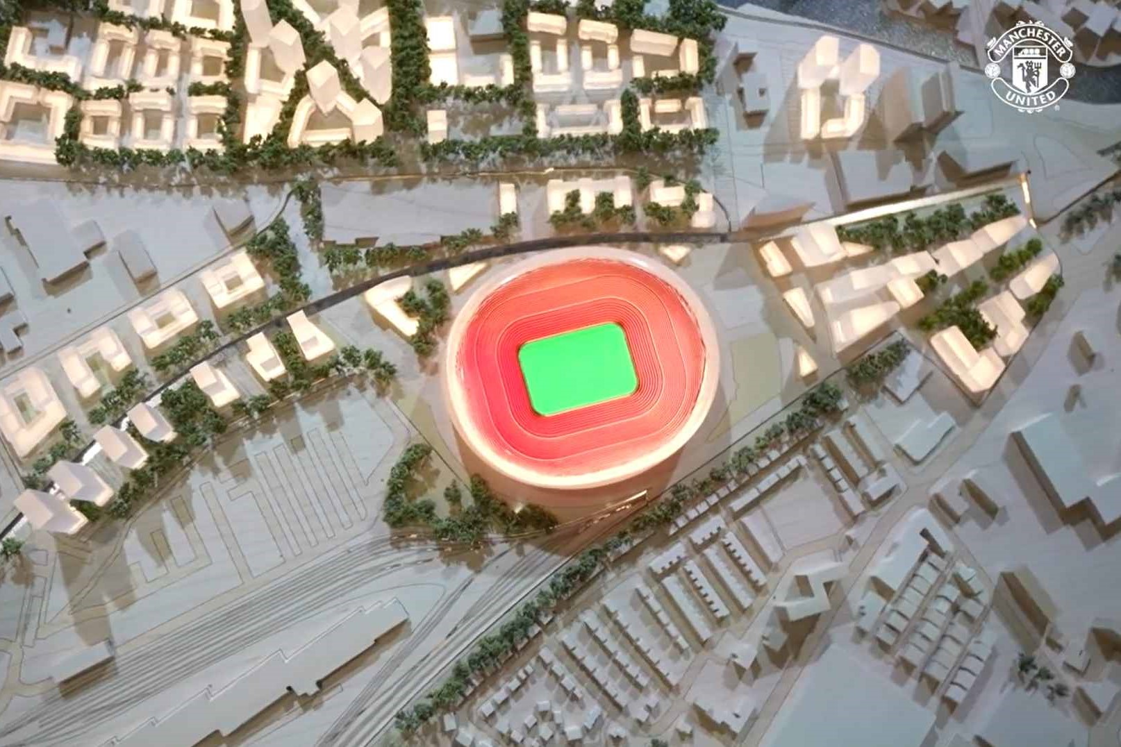 Scale model of a proposed Manchester United stadium surrounded by homes and regeneration near Old Trafford